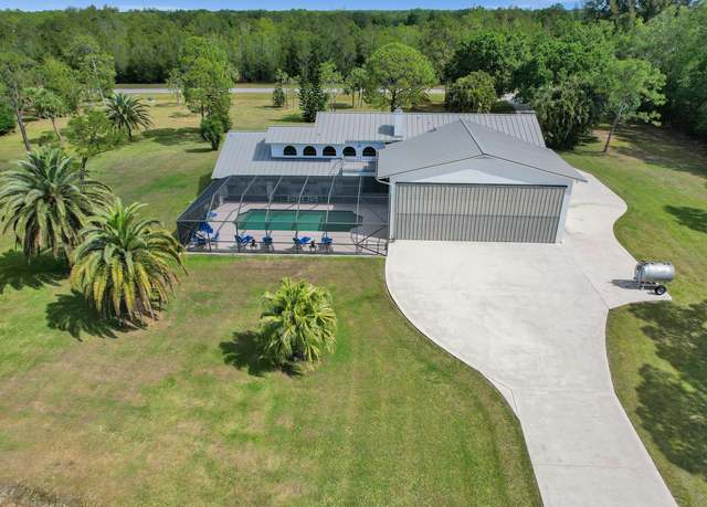 Property at 3120 SE Downwinds Rd, Jupiter, FL 33478, 4 beds, 4 baths