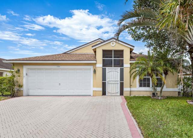 Property at 1784 Sawgrass Cir, Greenacres, FL 33413, 3 beds, 2 baths