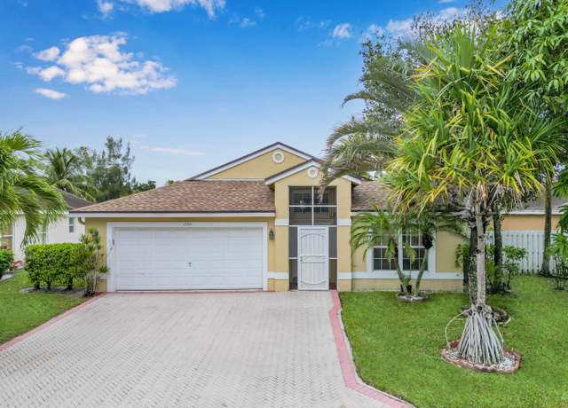 Property at 1784 Sawgrass Cir, Greenacres, FL 33413, 3 beds, 2 baths