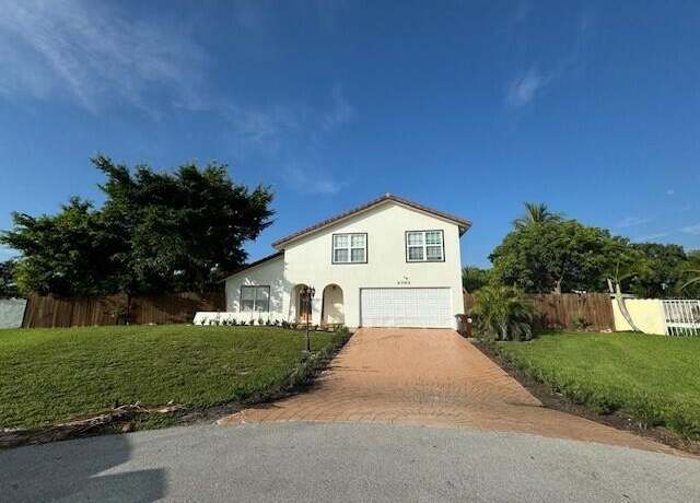 Property at 6785 Escondida Dr, Lake Clarke Shores, FL 33406, 3 beds, 2.5 baths