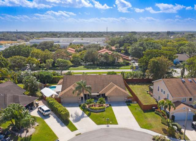 Property at 1322 NW 13th Ct, Boca Raton, FL 33486, 6 beds, 4 baths