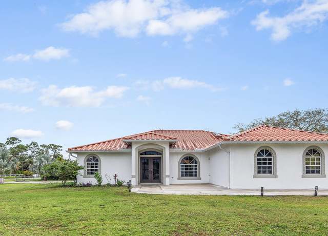Property at 13548 71st Pl N, West Palm Beach, FL 33412, 3 beds, 2 baths