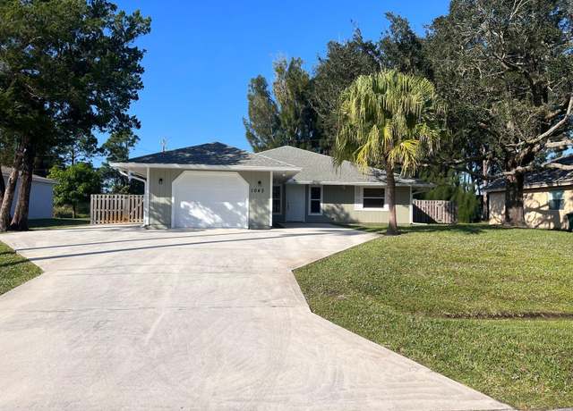 Property at 1045 SW Bay State Rd, Port Saint Lucie, FL 34953, 3 beds, 2 baths