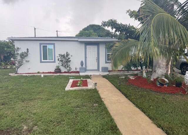 Property at 2329 West Dr, West Palm Beach, FL 33409, 4 beds, 3 baths