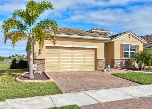 Property at 12377 SW Arabella Dr, Port Saint Lucie, FL 34987, 4 beds, 2 baths