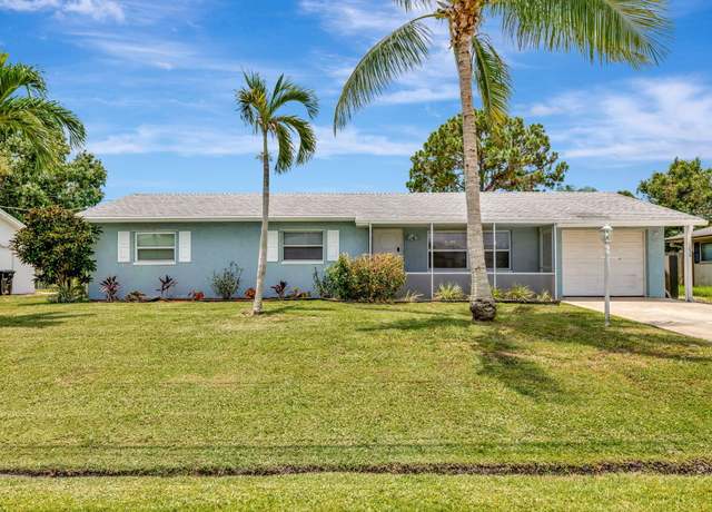 Property at 1234 SE Petunia Ave, Port Saint Lucie, FL 34952, 3 beds, 2 baths