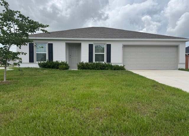 Property at 591 SW Halifax Ave, Port Saint Lucie, FL 34953, 3 beds, 2 baths