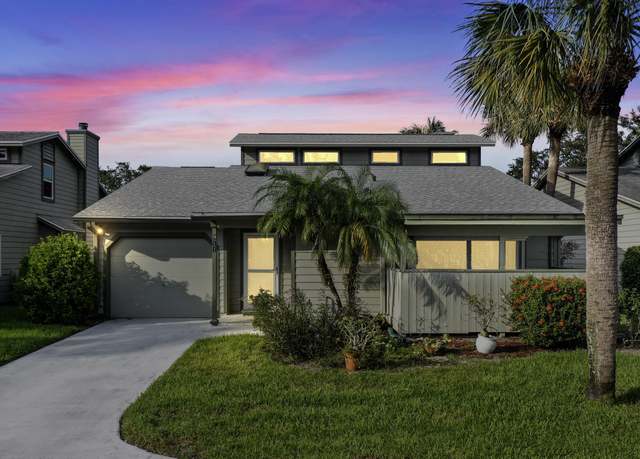 Property at 911 NE Dahoon Ter, Jensen Beach, FL 34957, 3 beds, 3 baths