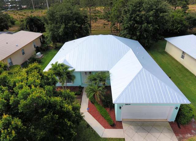 Property at 5834 NW Windy Pines Ln, Port Saint Lucie, FL 34986, 4 beds, 2 baths