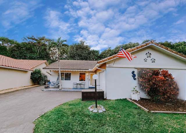 Property at 402 Shadow Wood Ln, Coral Springs, FL 33071, 3 beds, 2 baths