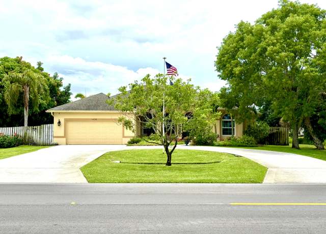 Property at 1456 SW Del Rio Blvd, Port Saint Lucie, FL 34953, 4 beds, 2 baths