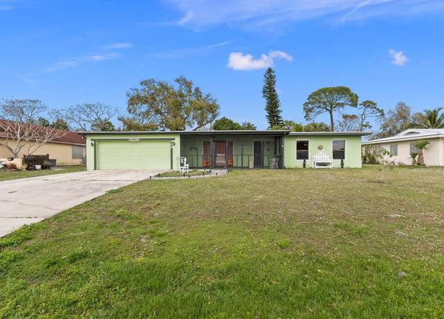 Property at 409 SE Tranquilla Ave, Port Saint Lucie, FL 34983, 4 beds, 2 baths