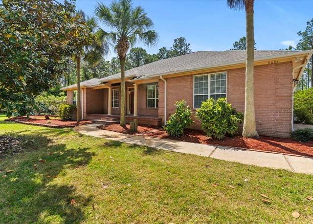 Property at 9601 Sunnybrook Dr, Navarre, FL 32566, 4 beds, 2 baths
