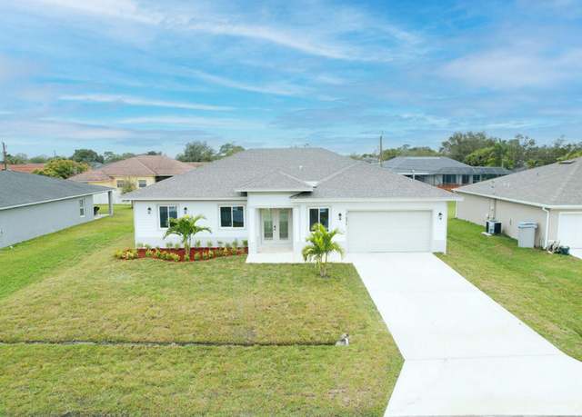 Property at 1434 SW Oriole Ln, Port Saint Lucie, FL 34953, 4 beds, 3 baths