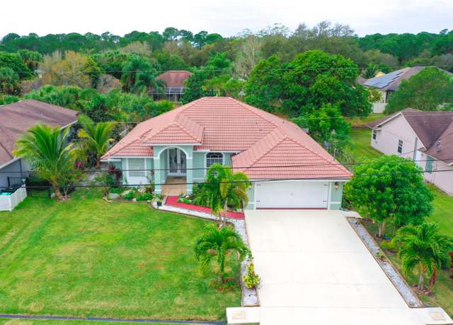 Property at 1844 SW Bradway Ln, Port Saint Lucie, FL 34952, 4 beds, 2 baths