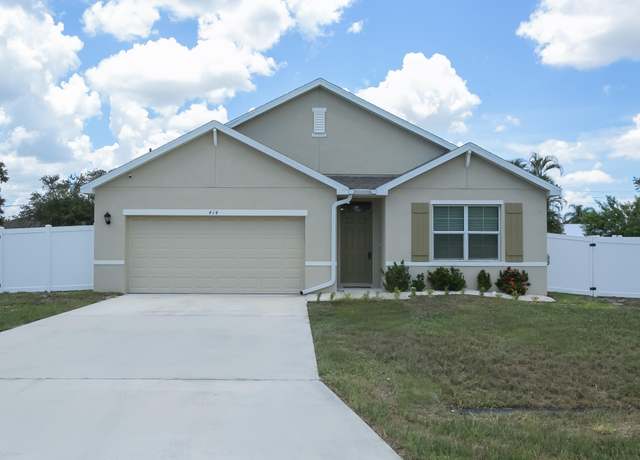 Property at 414 SE Fairchild Ave, Port Saint Lucie, FL 34984, 4 beds, 2 baths