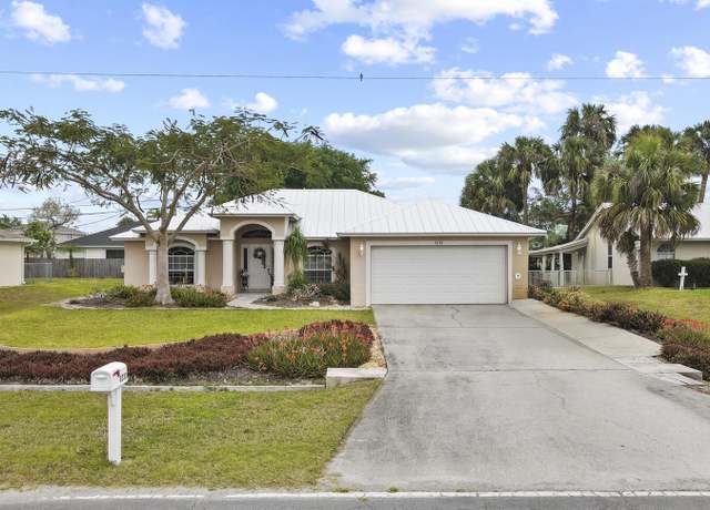 Property at 2233 SW Import Dr, Port Saint Lucie, FL 34953, 3 beds, 2 baths