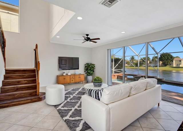 Property at 119 Canterbury Pl, Royal Palm Beach, FL 33414, 4 beds, 2.5 baths