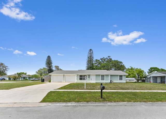 Property at 303 NE Solida Cir, Port Saint Lucie, FL 34983, 4 beds, 3 baths