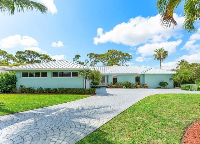 Property at 474 S Country Club Dr, Atlantis, FL 33462, 4 beds, 3 baths