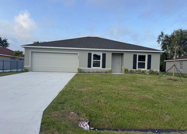 Property at 1438 SW Goodman Ave, Port Saint Lucie, FL 34953, 3 beds, 2 baths