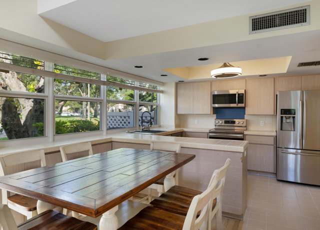 Property at 8101 Oakton Ct Unit 1a, Lake Clarke Shores, FL 33406, 3 beds, 2 baths