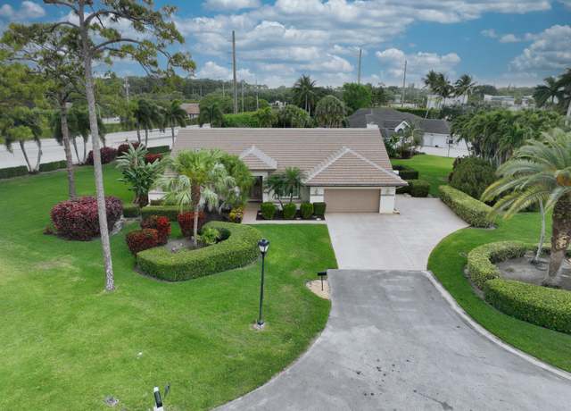 Property at 109 Westwood Ct, Atlantis, FL 33462, 4 beds, 2.5 baths