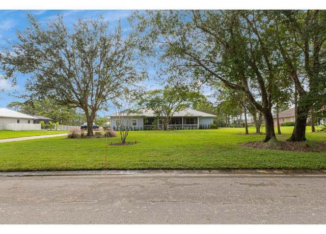 Property at 10611 Pine Needle Dr, Fort Pierce, FL 34945, 4 beds, 3 baths