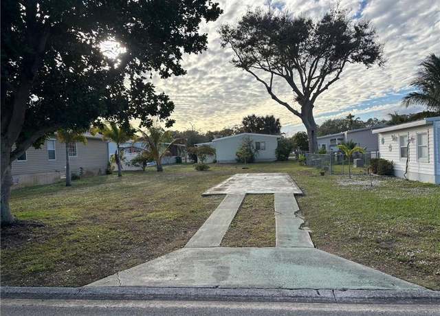 Property at 419 Plover Dr, Barefoot Bay, FL 32976