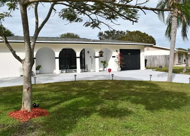 Property at 234 NE Surrey St, Port Saint Lucie, FL 34983, 3 beds, 2 baths