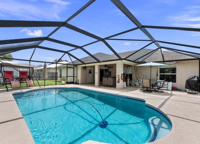 Property at 397 SW Jeanne Ave, Port Saint Lucie, FL 34953, 4 beds, 2 baths