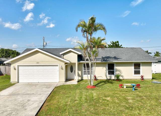 Property at 311 SE Navy Ave, Port Saint Lucie, FL 34984, 3 beds, 2 baths