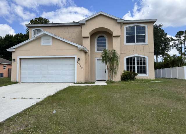 Property at 1965 SW Bellevue Ave, Port Saint Lucie, FL 34953, 4 beds, 2.5 baths