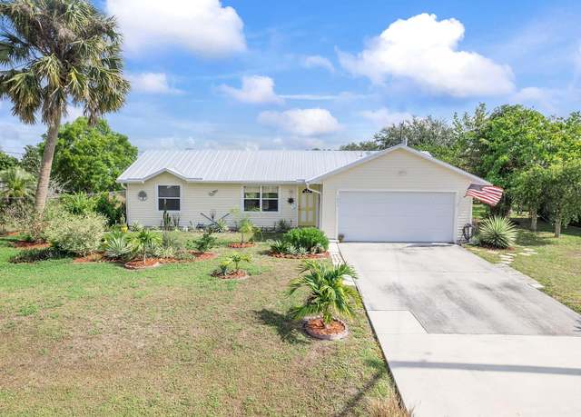 Property at 1073 SW Dubuque Ave, Port Saint Lucie, FL 34953, 3 beds, 2 baths