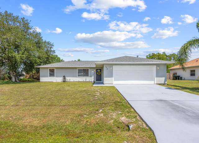 Property at 1087 Flower St NW, Palm Bay, FL 32907, 3 beds, 2 baths