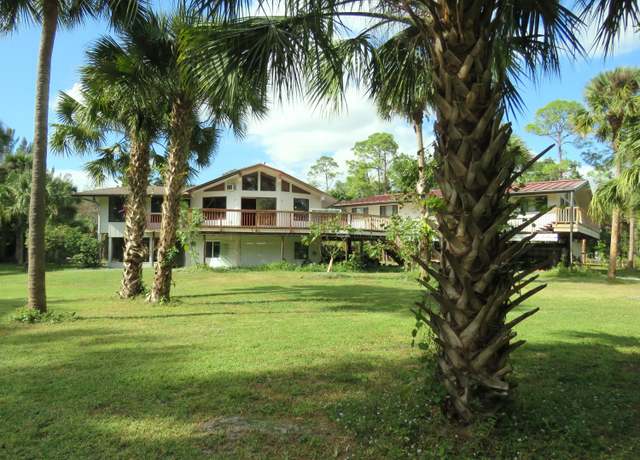 Property at 1464 Gallop Dr, Loxahatchee, FL 33470, 4 beds, 4 baths