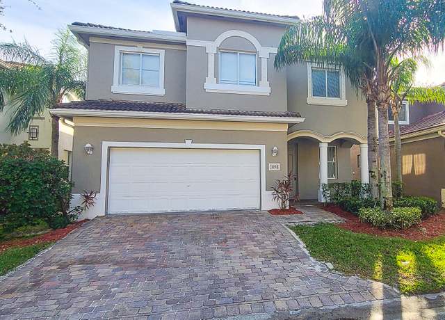 Property at 1098 Center Stone Ln, Riviera Beach, FL 33404, 5 beds, 3.5 baths