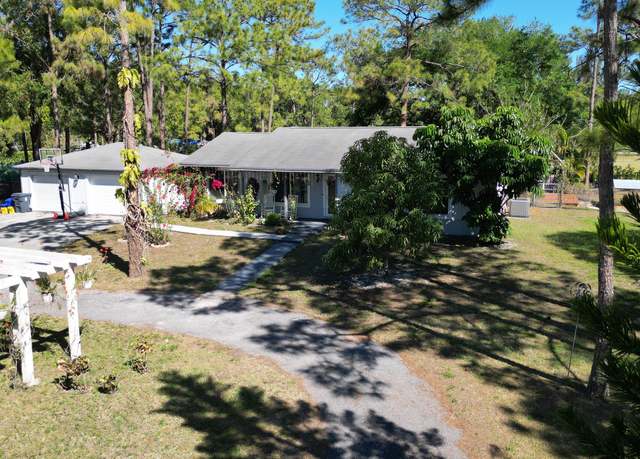 Property at 13619 57th Pl N, West Palm Beach, FL 33411, 3 beds, 2 baths