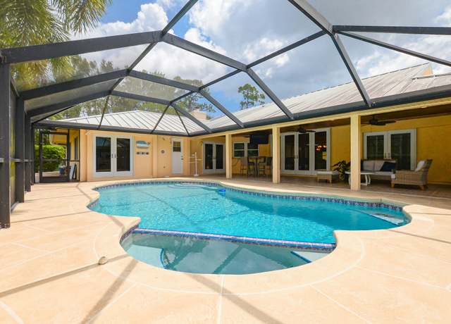 Property at 2610 SE Erickson Dr, Port Saint Lucie, FL 34984, 4 beds, 3 baths