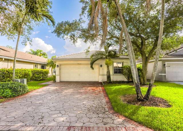 Property at 5411 NW 49th Ct, Coconut Creek, FL 33073, 4 beds, 2 baths
