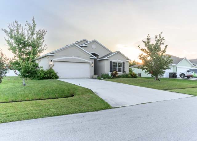 Property at 1822 SW Hampshire Ln, Port Saint Lucie, FL 34953, 4 beds, 2 baths