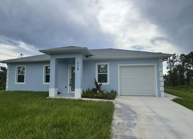 Property at 528 Aspen Ave S, Lehigh Acres, FL 33974, 3 beds, 3 baths