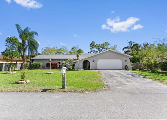 Property at 25 W Plumosa Ln, Lake Worth, FL 33467, 4 beds, 2 baths