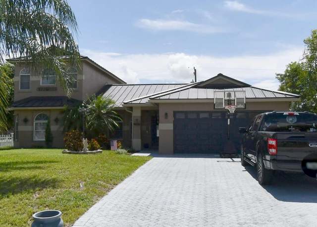 Property at 552 SW Dauphin Ave, Port Saint Lucie, FL 34953, 4 beds, 3 baths