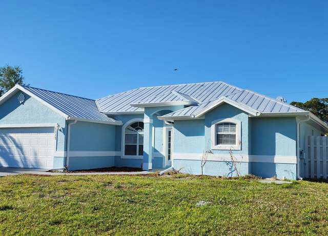 Property at 1117 SW Sudder Ave, Port Saint Lucie, FL 34953, 4 beds, 3 baths