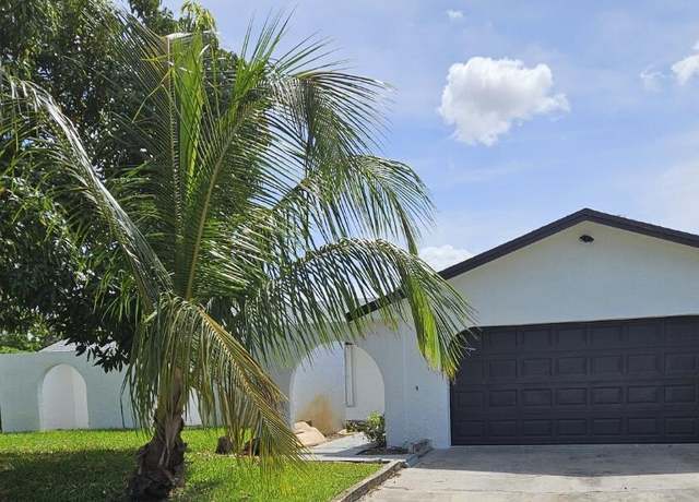 Property at 1123 Woodbine Rd, West Palm Beach, FL 33417, 4 beds, 2 baths