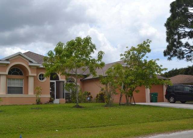 Property at 738 SE Lansdowne Ave, Port Saint Lucie, FL 34983, 4 beds, 3 baths