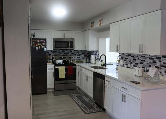 Property at 855 Azalea Dr, Royal Palm Beach, FL 33411, 3 beds, 3 baths