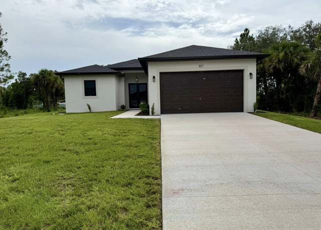 Property at 811 Thompson Ave, Lehigh Acres, FL 33972, 3 beds, 2 baths