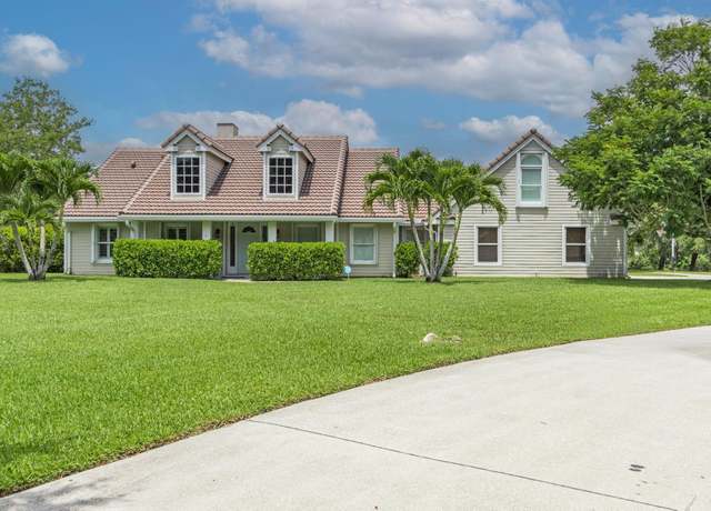 Property at 5703 Lago Del Sol Dr, Lake Worth, FL 33449, 4 beds, 2.5 baths